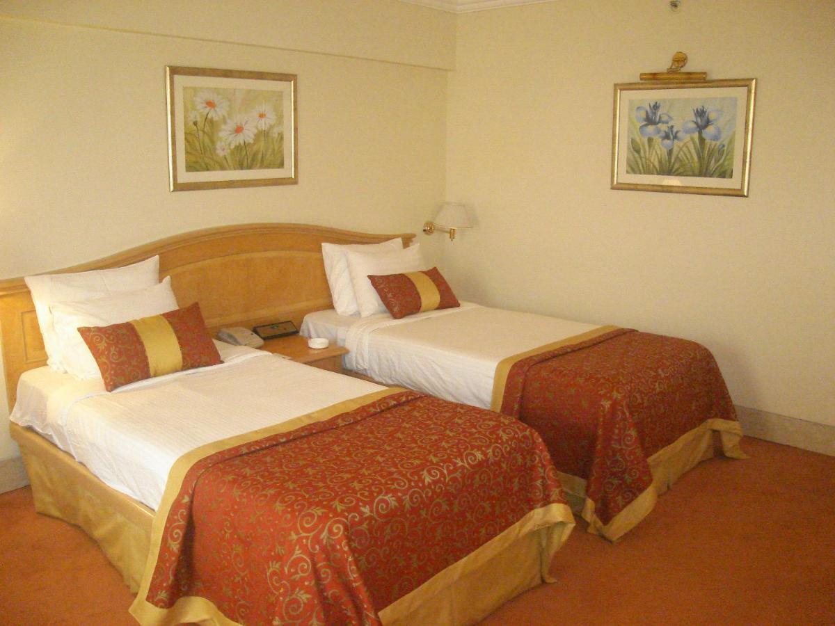 Hotel Ramada Plaza By Wyndham Palm Grove Bombaj Zewnętrze zdjęcie A room at the hotel