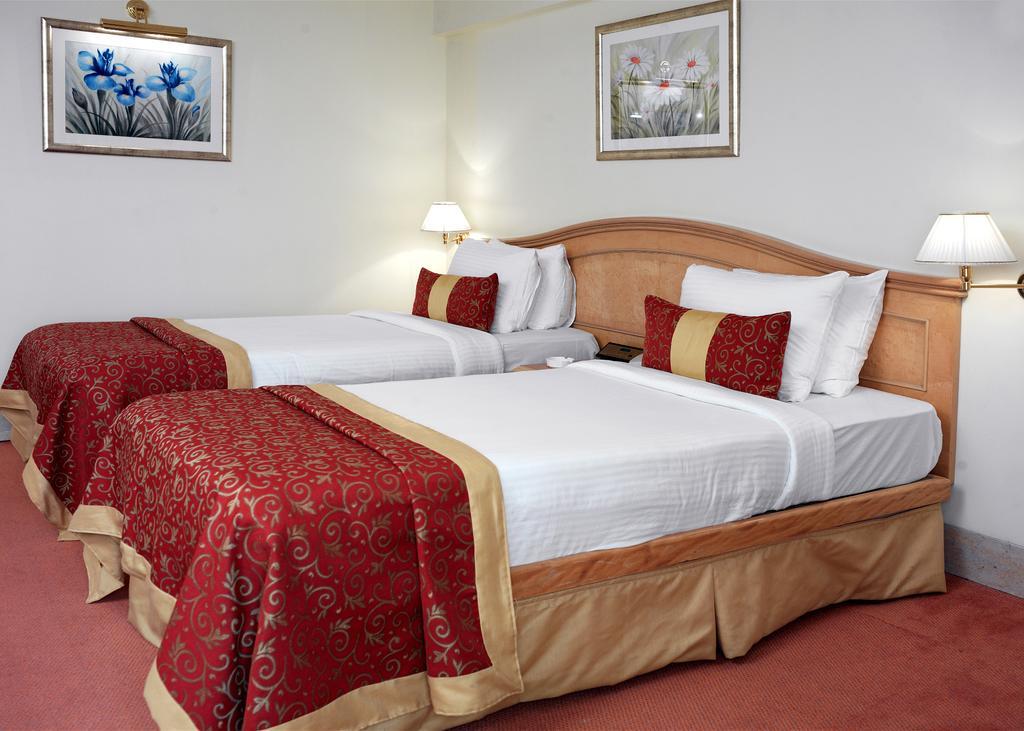 Hotel Ramada Plaza By Wyndham Palm Grove Bombaj Zewnętrze zdjęcie A guest room at the hotel